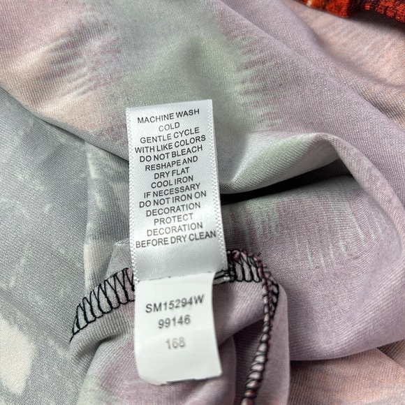 Melissa Paige NWT Black/Orange Long Blouse with front key hole Size 1x - Picture 11 of 11